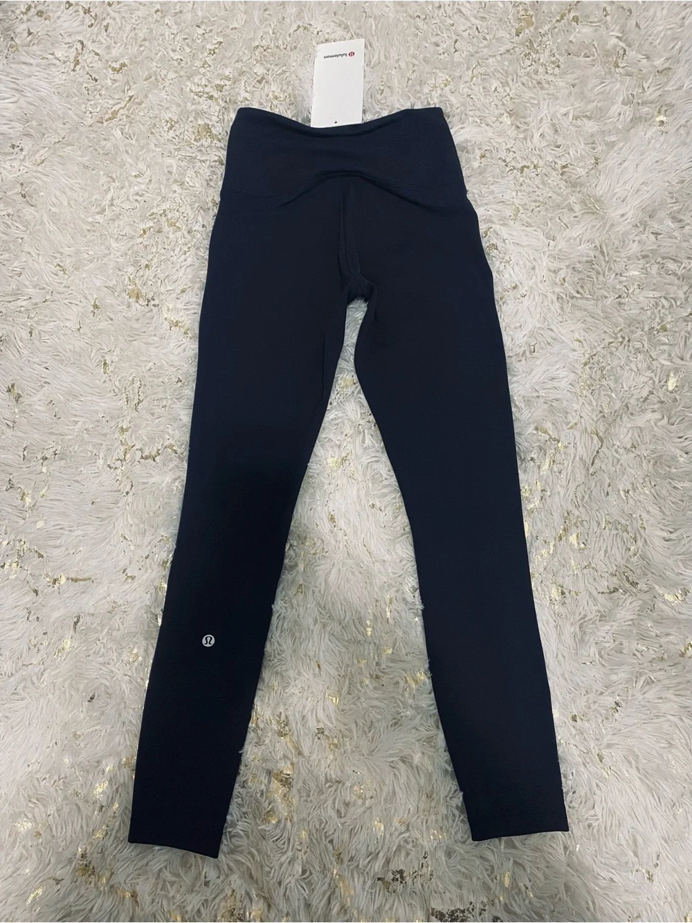 lululemon athletica Black Wunder Train High-Rise Tight 25". Size. 4 - Picture 13 of 14